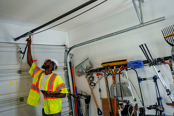 Professional Garage Door Roller Replacement technician working in Elmont, NY